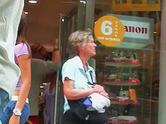 Non-nude street voyeur video of a terrific ass going shopping