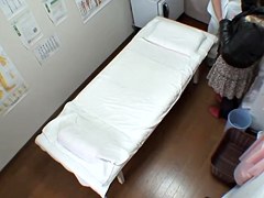Big booty Japanese caught in a voyeur massage video