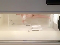 Kinky MILF washes in hot voyeur shower room video