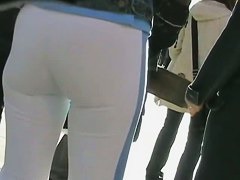 Trashy teens get videoed by a voyeur on the street