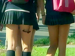 Street candid clip with the view of shorts up skirt