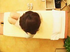 Hidden camera in a massage room video of an asian girl