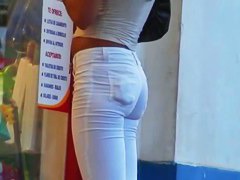 Delicious butt in white jean filmed on street hidden cam