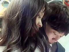 Asian beauty in black pantyhose is sucking dick and getting fucked in a public bus