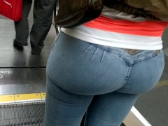 Candid large bum legal age girlr in black jeans