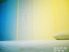 Young Asian couple having sex in a spy cam video