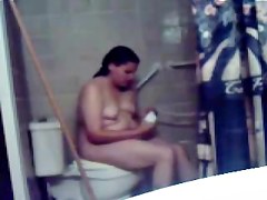 My chubby girlfriend masturbating with head shower