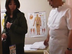 Shy asian recorded on a spy cam in massage room