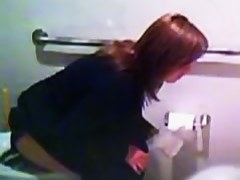 Fresh Asian girls peeing in the school toilet
