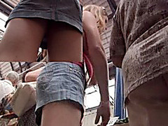Big bum in white skirt is shown on a hidden spy cam