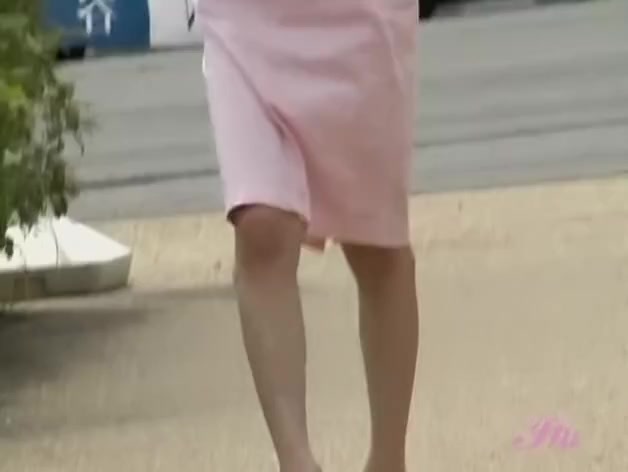 Sharking of a stunning slender girl on streets of Japan