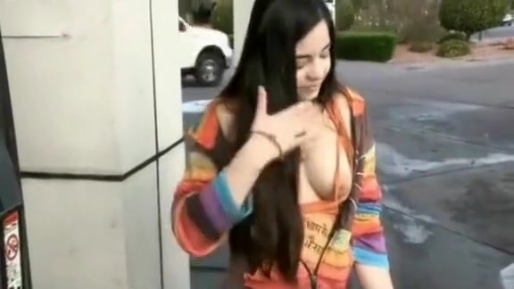 Girlfriend has her tits out as she gasses the car