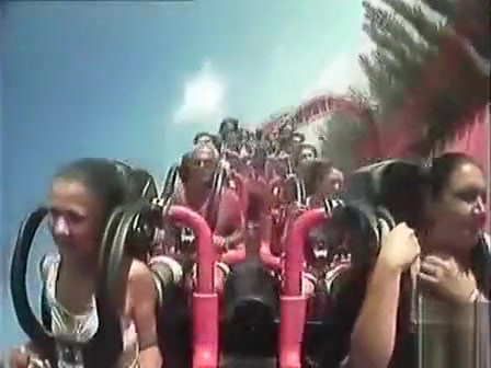 Roller coaster ride makes her big tits pop out
