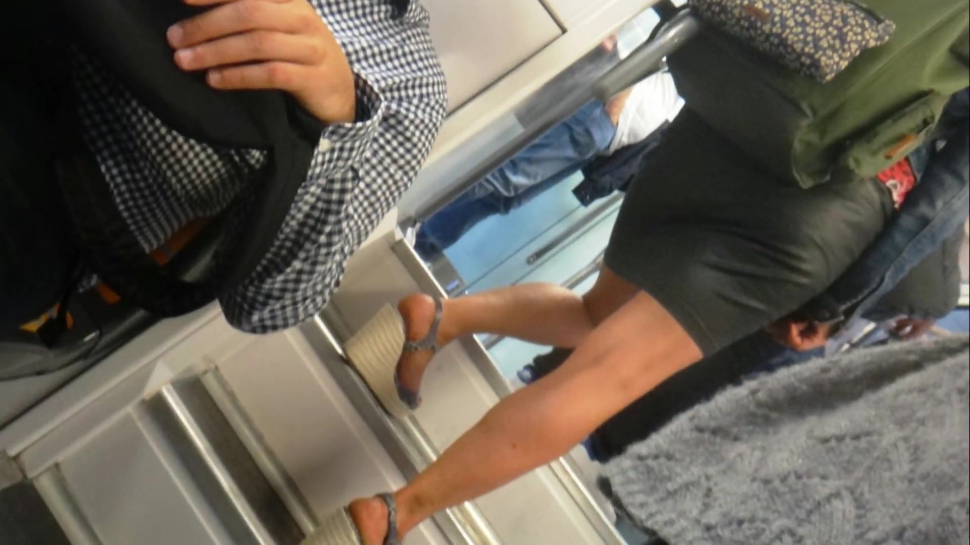 feet fetish big ass with tight skirt in the subway