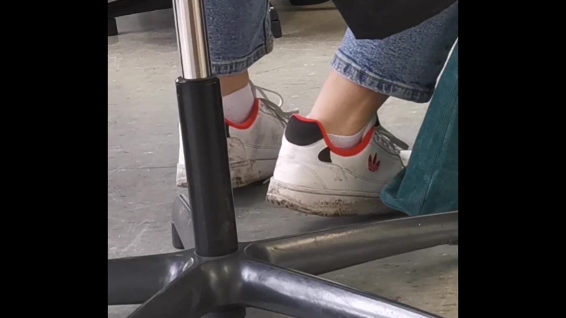 candid feet in white ankle socks and sneakers image