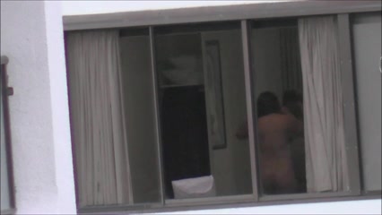 Naked In Hotel Window