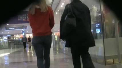 Big ass blonde caught with spy camera in the mall